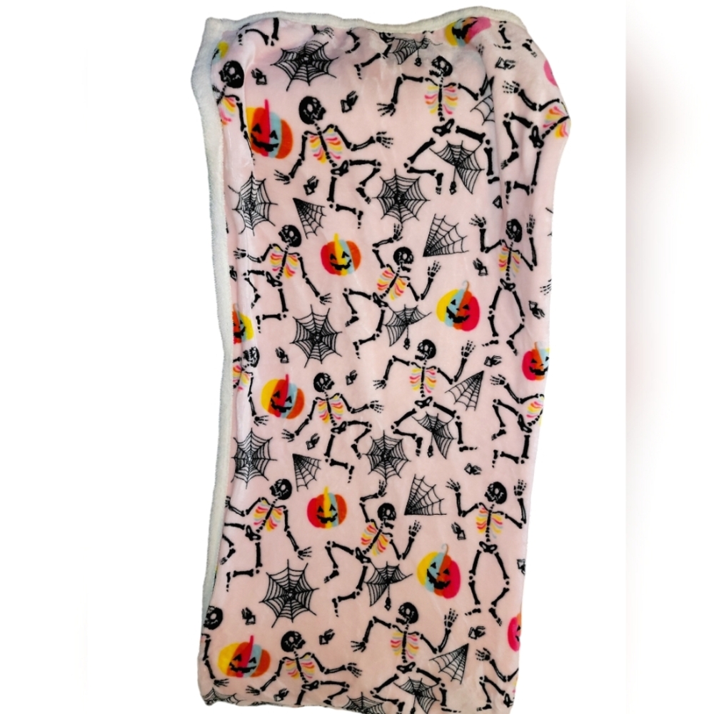 Pink Halloween skeleton throw blanket